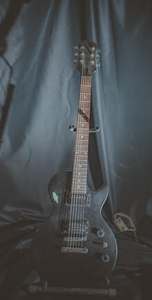 dark gray electric guitar