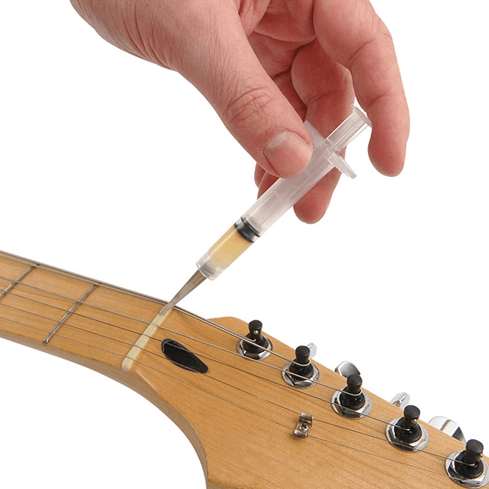 Rosy Brown daddario-lubrikit-friction-remover-for-nut-tremolo-and-bridge Guitar Accessories
