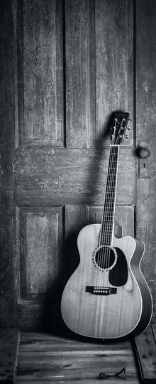 black and white picture acoustic guitar